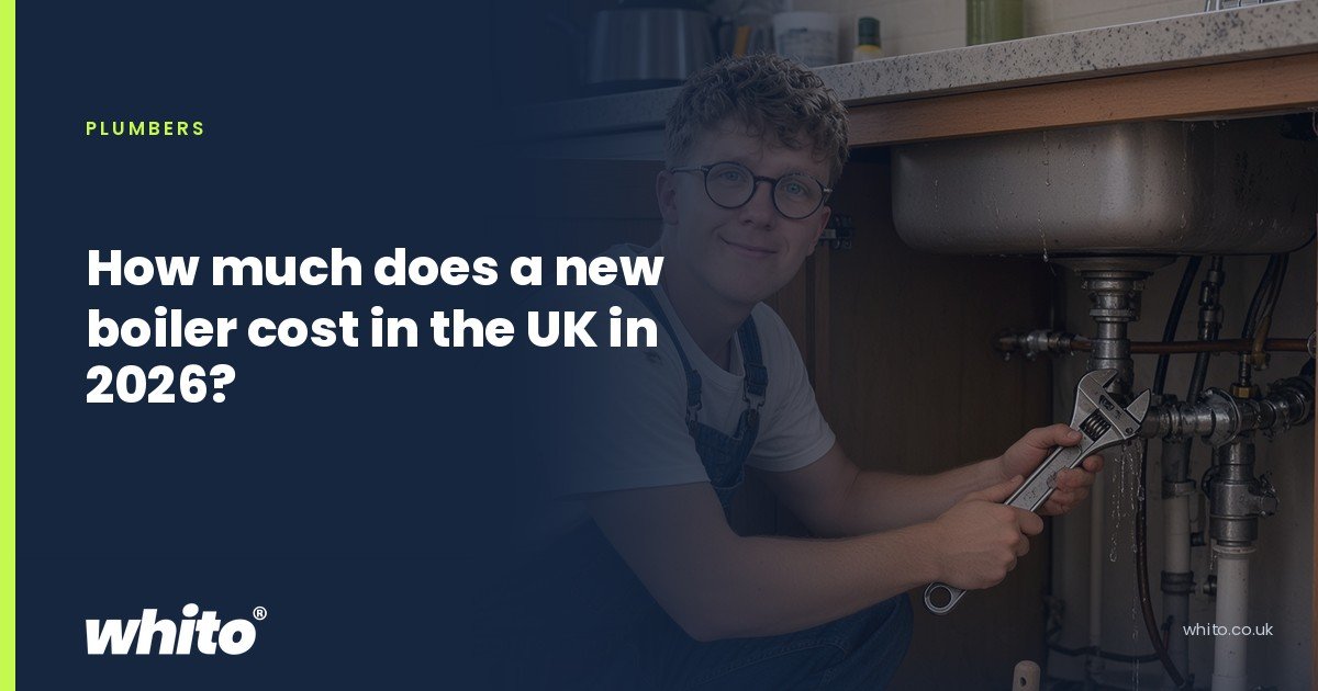 Whito founder pictured as a plumber kneeling under a kitchen sink with an adjustable spanner, on a navy Whito card headed “How much does a new boiler cost in the UK in 2026?”.